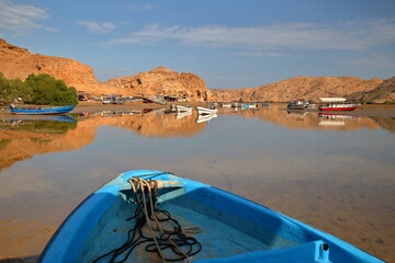 The Fjords of Bandar Al Khairan, located 30 km East from Muscat, Oman, with desert landscape, clear and colorful water, beaches and rocky mountains