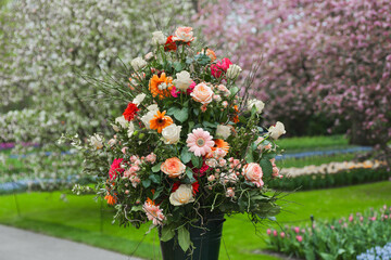 Bouquet of a beautiful flowers with gerbera and roses decoration background Flowers scape