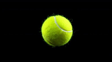Super Slow Motion Detail Shot of Rotating Tennis Ball at 1000 fps. - Powered by Adobe