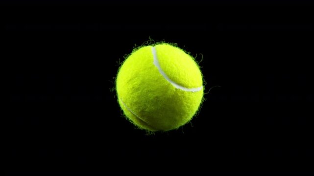 Super Slow Motion Detail Shot of Rotating Tennis Ball at 1000 fps.