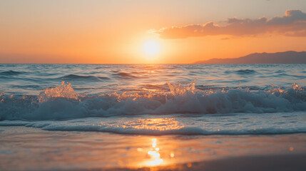 Fototapeta premium A serene sunset over the ocean, with gentle waves reflecting the warm colors of the sky.