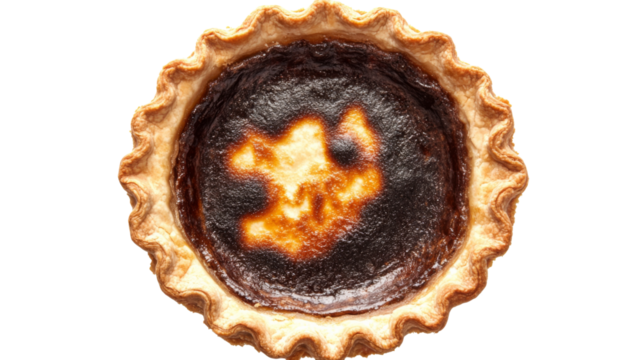 Burnt pie isolated on transparent background representing baking mistakes