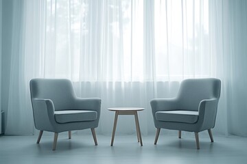 Two armchairs and small table by window.