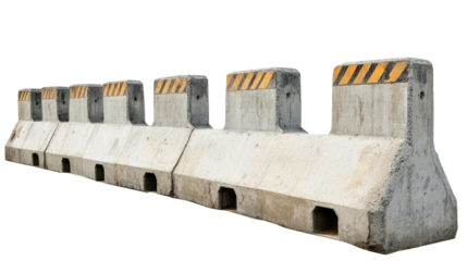 Row of concrete roadblocks forming a temporary traffic barricade, ensuring safety and access control