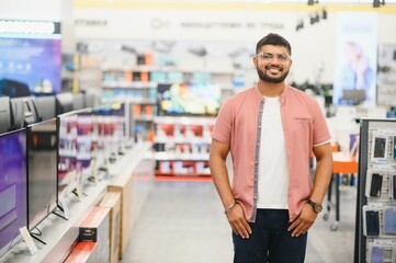 Indian man in an electronics store