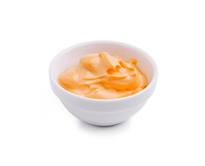 Creamy orange dip served in a white bowl perfect for snacks and appetizers at gatherings or parties