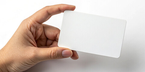 Obraz premium Hand Holding a Blank Card 10x15cm for Creative Use