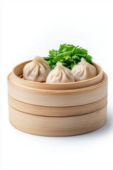 Floating steamed dumplings with dipping sauce, isolated on white background.