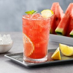 Cold summer drink made from watermelon with lemon and fresh mint.	