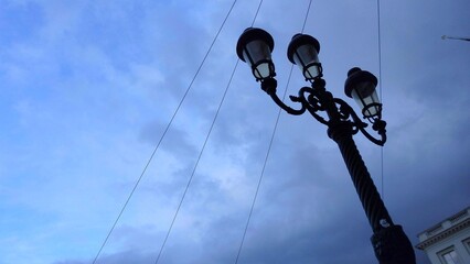 Antique garden lamp and night sky in the background 