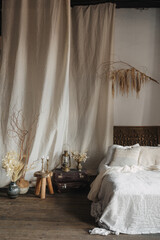 Chic bohemian bedroom with natural elements and cozy decor © brizmaker