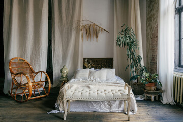 Cozy and modern bohemian bedroom interior with natural elements © brizmaker