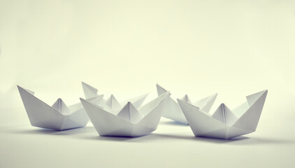 paper boats on the white background, business concept