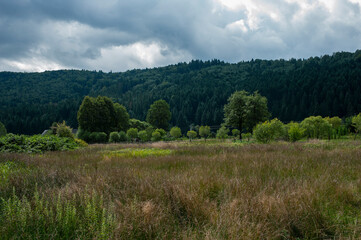 bright sunrise in the mountains with blue sky