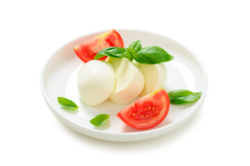Mozzarella with tomatoes and basil leaves isolated on white background.