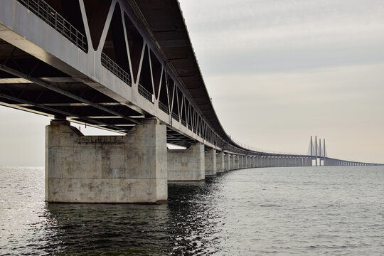 Oresund Bridge view from Swedish coast during the sunset.