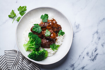 Beef meatballs with rice and broccoli. Scandinavian cuisine.