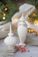 Luxurious handmade soy wax candle in cozy room, Christmas lights in the background