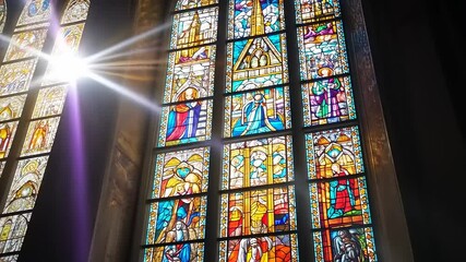 Sunbeams Illuminate Gothic Church's Vibrant Stained-Glass Windows - Powered by Adobe