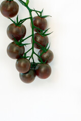 Red cherry tomatoes on a white background isolated on a white background