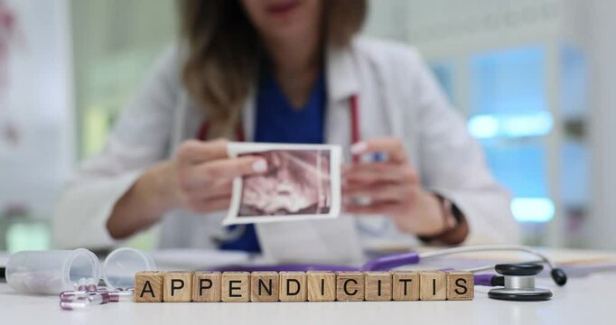 A qualified medical professional analyzes an image of appendicitis, highlighting the need for urgent care