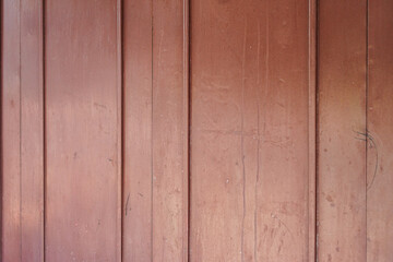 Obraz premium A close up image of a red wood panel texture. Suitable for backgrounds. Red Wooden Panel Texture Background