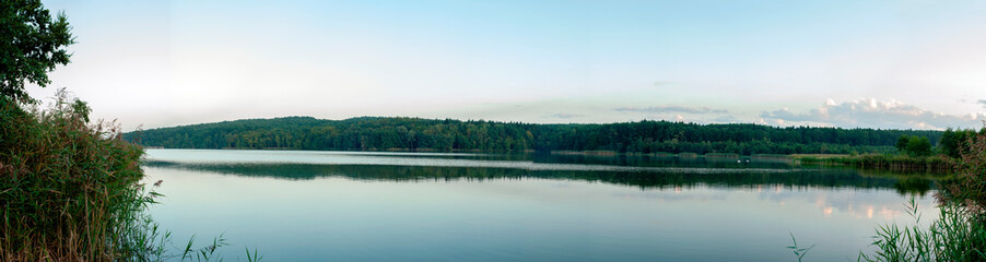 Panorama lake view in sunrise time.Sunrise at the lake