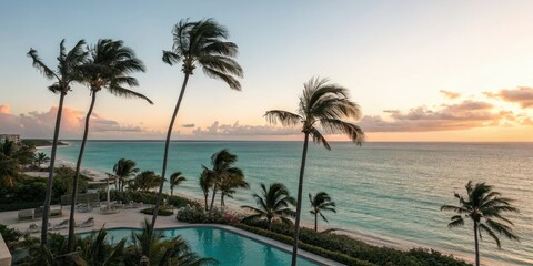 Obraz premium Sunset over calm turquoise ocean with palm trees swaying gently in the breeze, gentle waves, tropical paradise, natural wonder