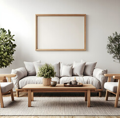 A simple and elegant Scandinavian-style living room with white walls, wooden furniture, plants on the table, sofa chairs in a gray color, and an empty wall frame mockup hanging above them. The 