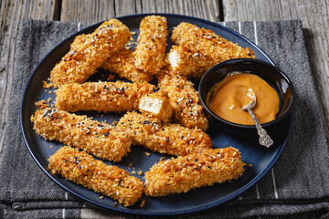 panko breaded tofu sticks with peanut butter sauce