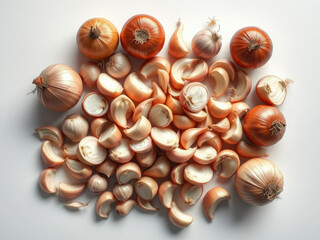 Obraz premium Top view of whole and sliced onions and garlic on white table, culinary art, staple foods, food styling, fresh produce