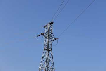 power lines against blue sky