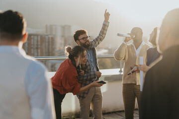 A group of business colleagues celebrate success by dancing and enjoying music on a high rooftop balcony during sunset, capturing a moment of happiness and camaraderie.