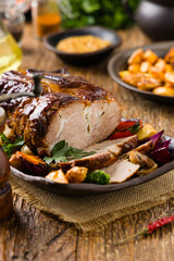 Whole roasted pork neck.