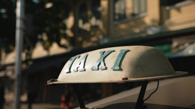 Close up of yellow tuk tuk taxi top roof light box on sunny day. Copy space famous concept of Bangkok
