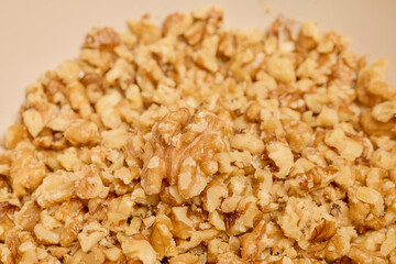 close up of crushed nuts ready to be used to prepare a dessert