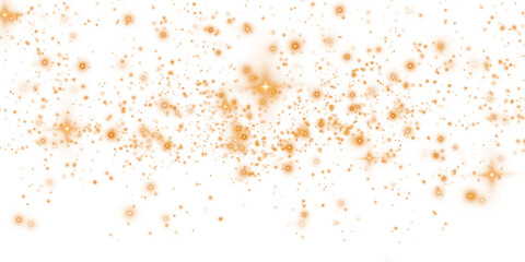 Golden sparks of dust and golden stars shine with special light. Christmas light effect. Golden sparkling particles of magic dust. PNG.