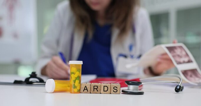 A dedicated healthcare worker meticulously studies ARDS while deeply focusing on various medical notes and documents