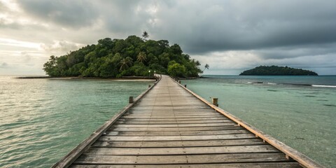 Wooden walkway extending to a lush tropical island under a dramatic sky
