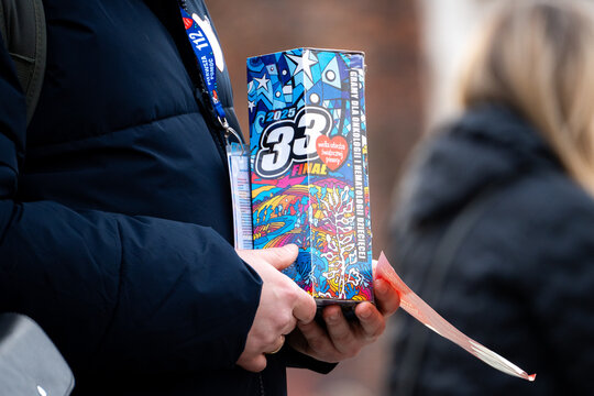 Volunteer of Great Orchestra of Christmas Charity Aid, with collection box to collect money during Grand Finale fundraiser. Wielka Orkiestra Świątecznej Pomocy on January 26, 2025 in Krakow, Poland.