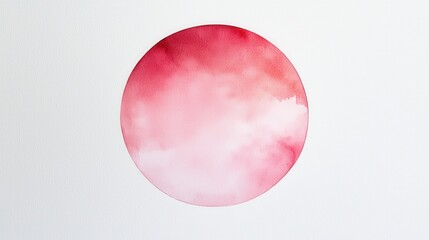 Abstract watercolor art with soft pink and red hues in a circular shape on a white background, evoking calmness and creativity.