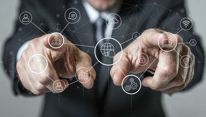A business professional points towards digital network icons, showcasing advanced technology concepts