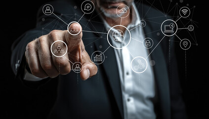 A business professional points towards digital network icons, showcasing advanced technology concepts