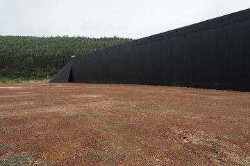 Gravel floors and a section of concrete tunnel and short hills