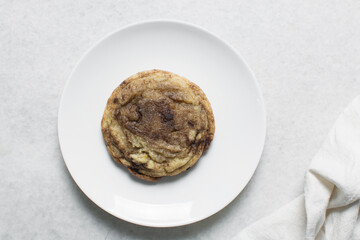 Overhead view of cinnamon cookies, top view of cinnamon vanilla cookies, process of making bakery style cookies