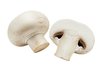 Fototapeta premium Two fresh mushrooms champignons, one whole and the other cut in half isolated on white background
