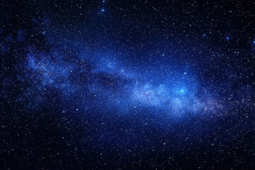 Glowing blue Milky Way stretching across the dark sky with stars scattered throughout.