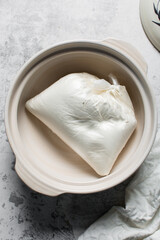 overhead view of All purpose flour in a bowl, baking flour in a bowl