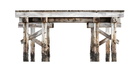 Weathered wooden pier structure against a transparent background