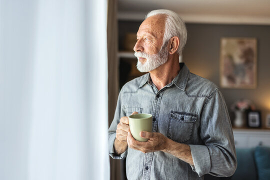 Happy, senior man in portrait drinking, thinking or planning to relax and enjoy healthy retirement or holiday in summer. Mature, male person and cup with smile for vision of future rest and care